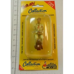 Elita Modelle 10115 Man siting tan suit with luggage figure - Your Source for Gaming Essentials